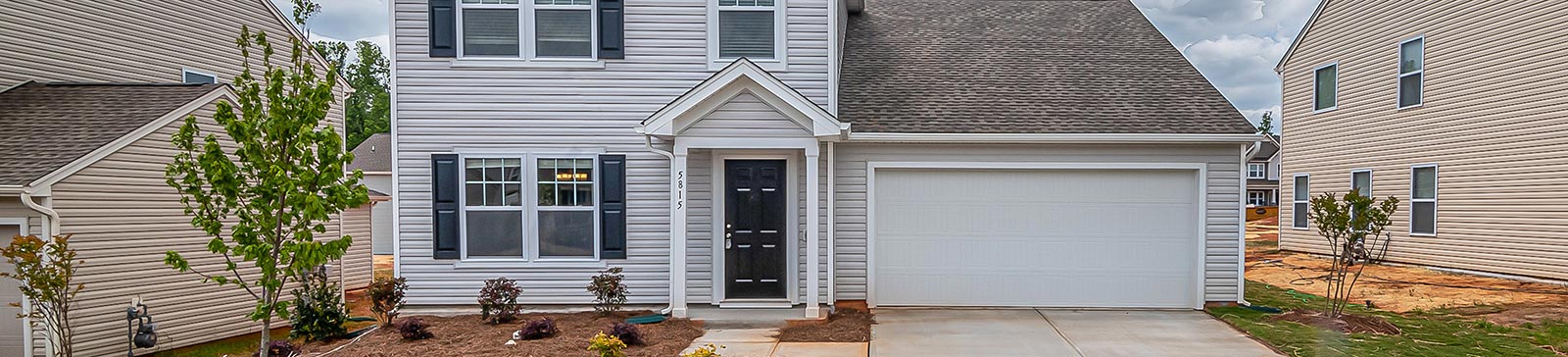 Technician performing garage door inspection and maintenance in Flushing, California