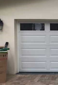 New steel sectional garage door installation – Flushing, NY
