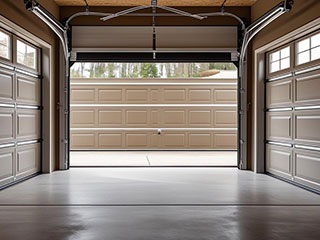 Interior view of insulated garage doors demonstrating thermal efficiency and improved comfort in Flushing, NY.